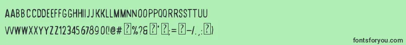 フォントDesertRoad – 緑の背景に黒い文字