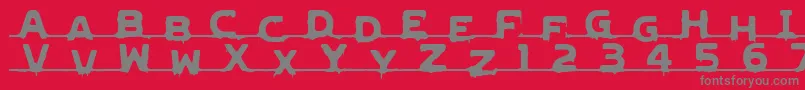 fuente LvdcGncdRmx2 – Fuentes Grises Sobre Fondo Rojo