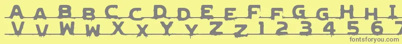 LvdcGncdRmx2 Font – Gray Fonts on Yellow Background