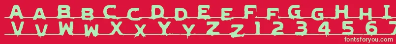 LvdcGncdRmx2 Font – Green Fonts on Red Background