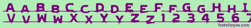 フォントLvdcGncdRmx2 – 緑の背景に紫のフォント