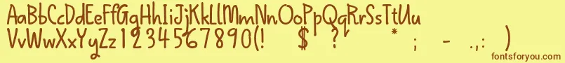 QokipopsFree-Schriftart – Braune Schriften auf gelbem Hintergrund