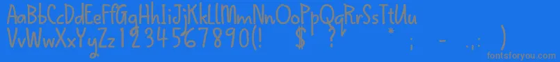 QokipopsFree-Schriftart – Graue Schriften auf blauem Hintergrund