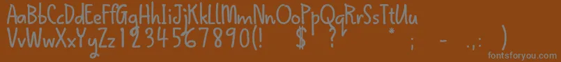 Шрифт QokipopsFree – серые шрифты на коричневом фоне