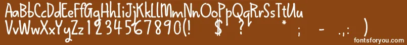 QokipopsFree-fontti – valkoiset fontit ruskealla taustalla