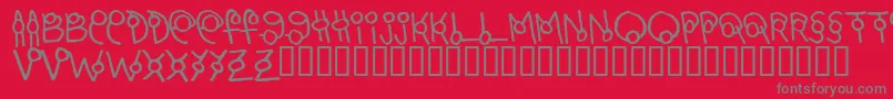 フォントMarto – 赤い背景に灰色の文字