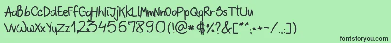 フォントSloppyHand – 緑の背景に黒い文字