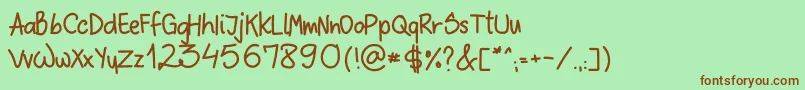 SloppyHand Font – Brown Fonts on Green Background