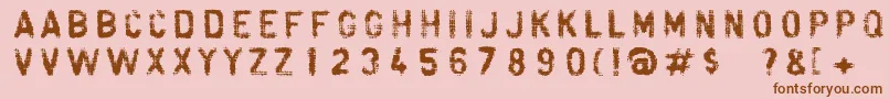 Fonte Fibra – fontes marrons em um fundo rosa