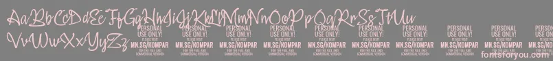 フォントKomparThinPersonalUseOnly – 灰色の背景にピンクのフォント