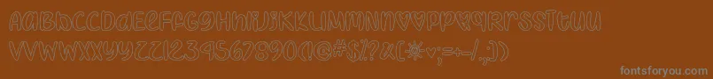 IHeartColoringOtf-Schriftart – Graue Schriften auf braunem Hintergrund