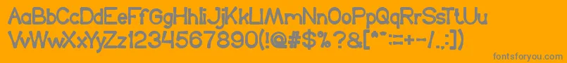 フォントKingOfTheWorld – オレンジの背景に灰色の文字