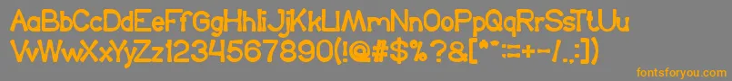 フォントKingOfTheWorld – オレンジの文字は灰色の背景にあります。