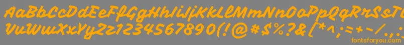フォントVampirooneRegular – オレンジの文字は灰色の背景にあります。