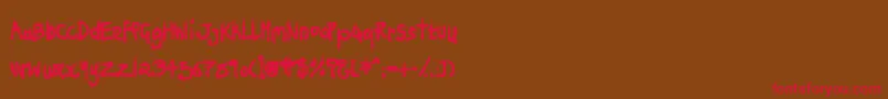 NinjaPenguin Font – Red Fonts on Brown Background