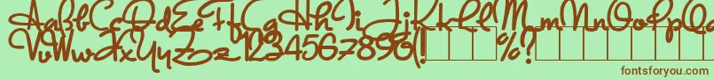 フォントDandyHatTrick – 緑の背景に茶色のフォント
