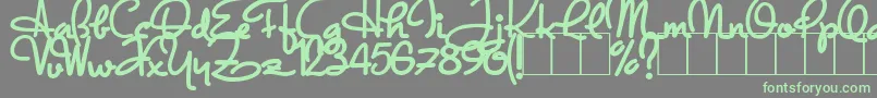 DandyHatTrick-Schriftart – Grüne Schriften auf grauem Hintergrund