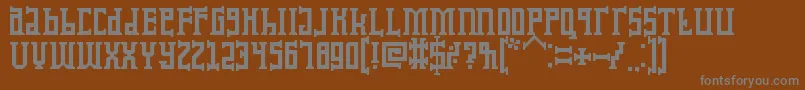 KoruptorAndTheBitches Font – Gray Fonts on Brown Background