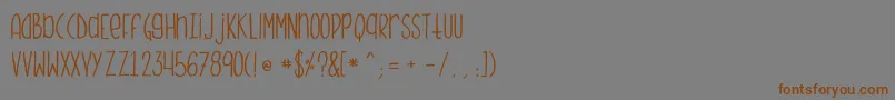 Monstermonster Font – Brown Fonts on Gray Background