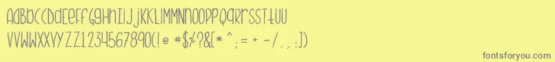 フォントMonstermonster – 黄色の背景に灰色の文字