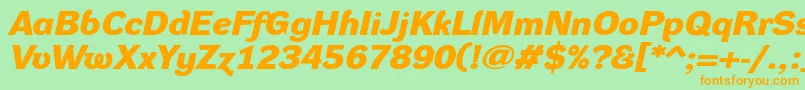 フォントDynagroteskdxeBolditalic – オレンジの文字が緑の背景にあります。