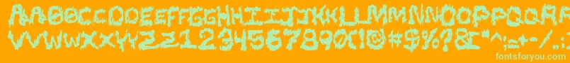 Blacsst Font – Green Fonts on Orange Background