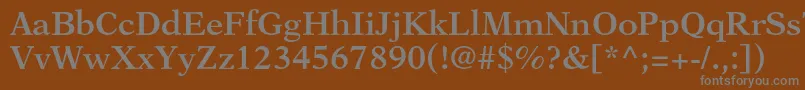 NewasterltstdSemibold-fontti – harmaat kirjasimet ruskealla taustalla