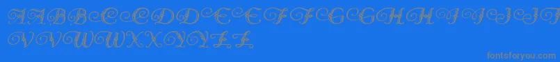 フォントDiamondDreams – 青い背景に灰色の文字