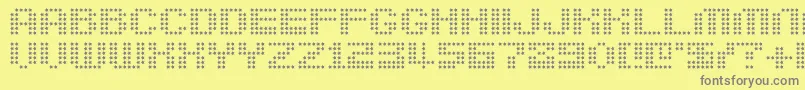 フォントBerirg – 黄色の背景に灰色の文字