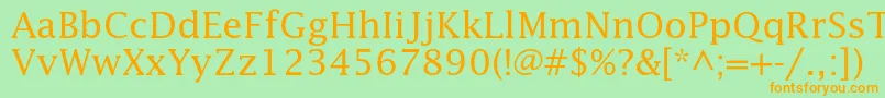フォントLucidastd – オレンジの文字が緑の背景にあります。