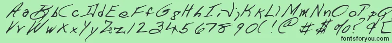 フォントDartRegular – 緑の背景に黒い文字