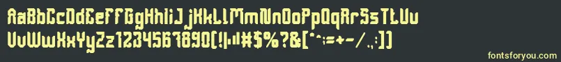 フォントDayakShieldBold – 黒い背景に黄色の文字