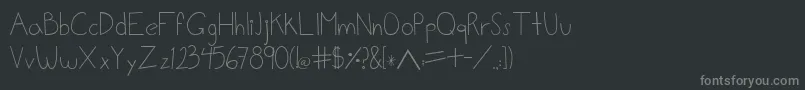 フォントLalo – 黒い背景に灰色の文字