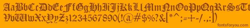 フォントCyrillicgoth – オレンジの背景に茶色のフォント