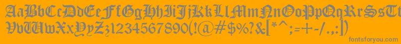 Cyrillicgoth-Schriftart – Graue Schriften auf orangefarbenem Hintergrund