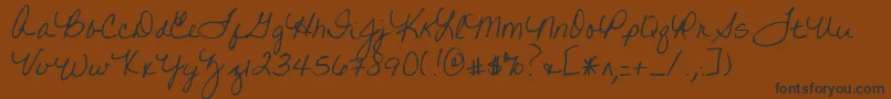 Writtenonhishands Font – Black Fonts on Brown Background