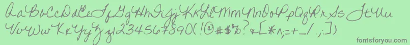 フォントWrittenonhishands – 緑の背景に灰色の文字