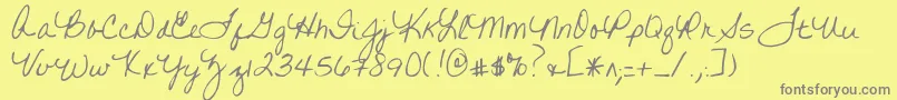 フォントWrittenonhishands – 黄色の背景に灰色の文字