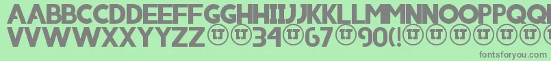 Iniico Font – Gray Fonts on Green Background