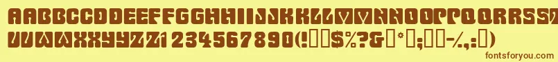 フォントWowserdisplaycapsssk – 茶色の文字が黄色の背景にあります。