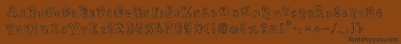 CartoonBlocksChristmas Font – Black Fonts on Brown Background