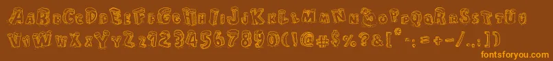 CartoonBlocksChristmas Font – Orange Fonts on Brown Background