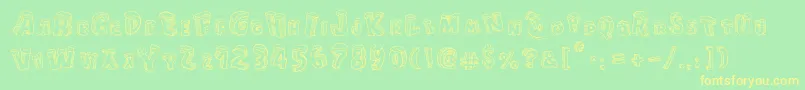 CartoonBlocksChristmas Font – Yellow Fonts on Green Background