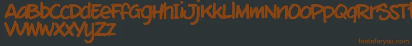 MixtmkT Font – Brown Fonts on Black Background