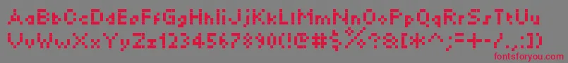フォントKylie – 赤い文字の灰色の背景
