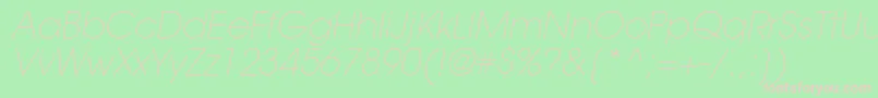 TrendexLightSsiExtraLightItalic-fontti – vaaleanpunaiset fontit vihreällä taustalla