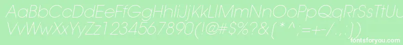 TrendexLightSsiExtraLightItalic-fontti – valkoiset fontit vihreällä taustalla