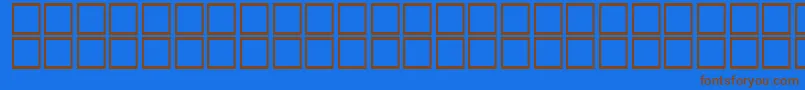 AlBattar Font – Brown Fonts on Blue Background
