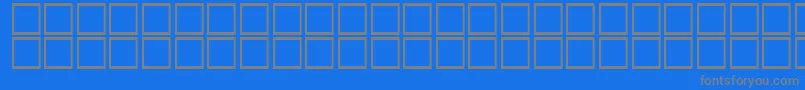AlBattar-fontti – harmaat kirjasimet sinisellä taustalla