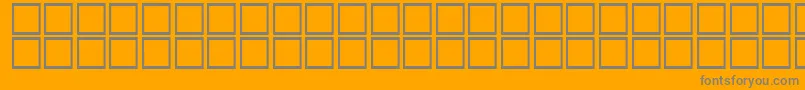 AlBattar-fontti – harmaat kirjasimet oranssilla taustalla